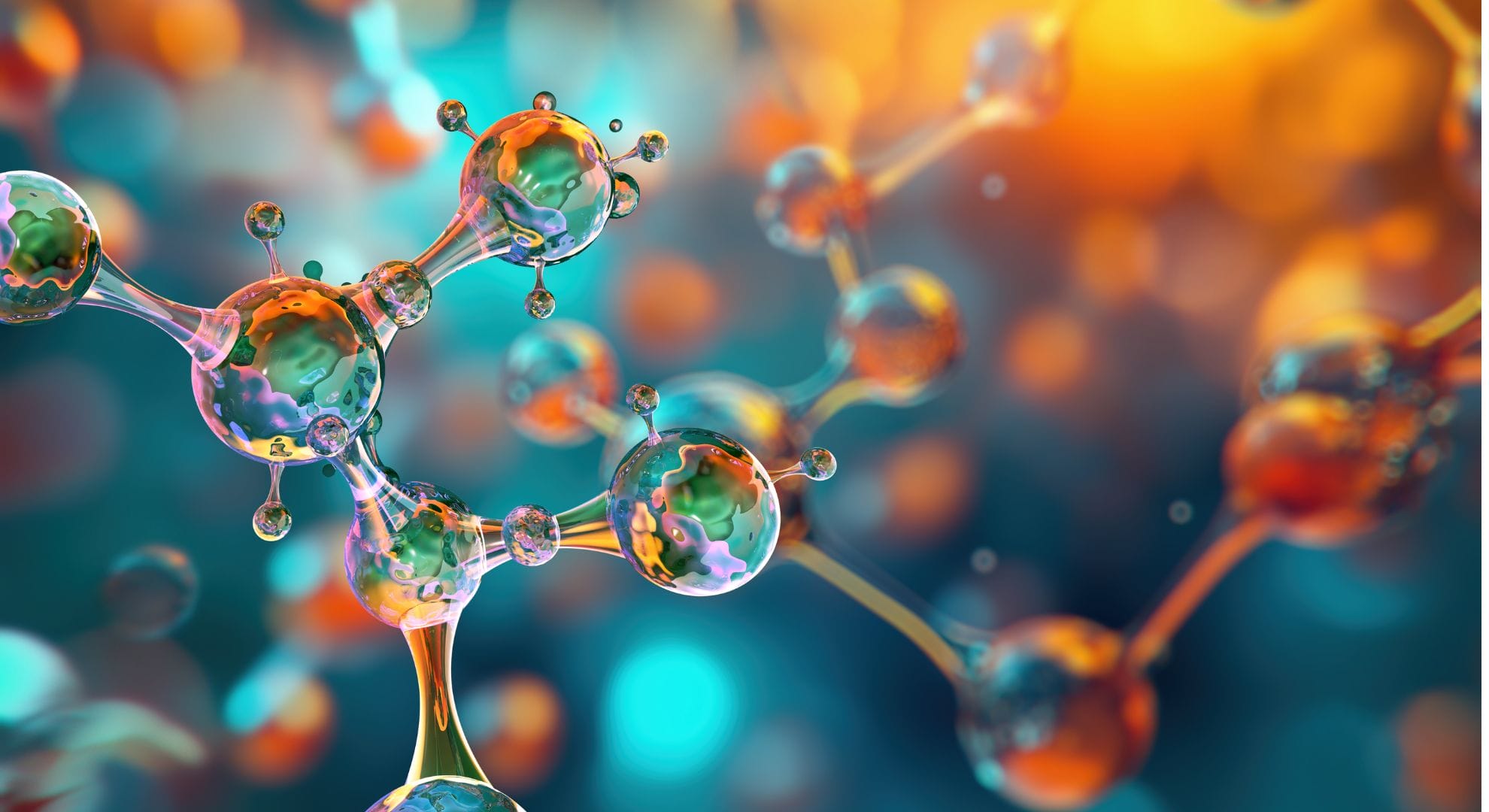 3D rendered molecular structures featuring transparent, glass-like spherical atoms with iridescent rainbow reflections connected by cylindrical bonds, set against a vibrant blurred background of warm orange and cool turquoise colors with bokeh light effects, representing advanced chemistry or materials science concepts.